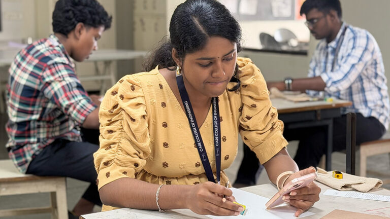 Design students creating linocut print artwork during hands-on printmaking workshop at CARE School of Design