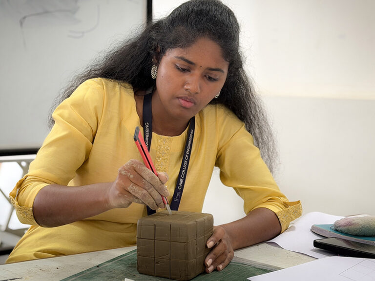 Bachelor of Design students learning clay modelling techniques during a hands-on workshop at CARE School of Design