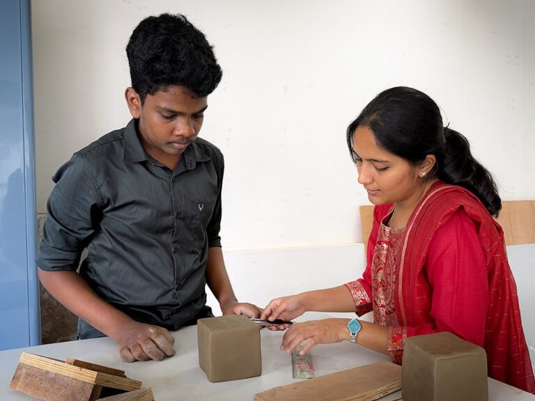 Bachelor of Design students learning clay modelling techniques during a hands-on workshop at CARE School of Design