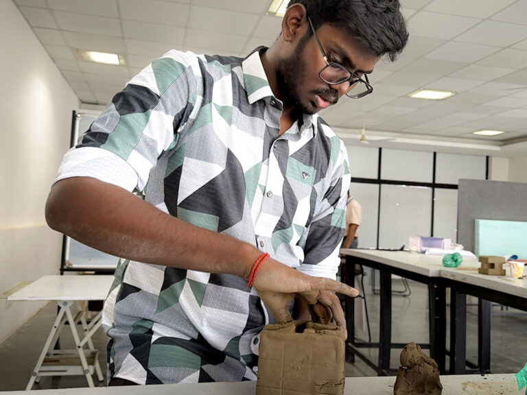 Bachelor of Design students learning clay modelling techniques during a hands-on workshop at CARE School of Design